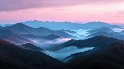 Obraz premium A peaceful sunrise hike with a panoramic view of the mountains.