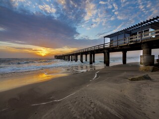 Wooden landing stage at Jetty 1905 and beach, Swakopmund, Namibia, Africa