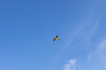 Superlight private plane flies in the sky