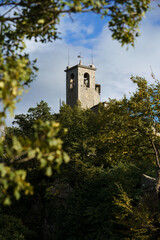 Fototapeta premium Historic tower among the trees