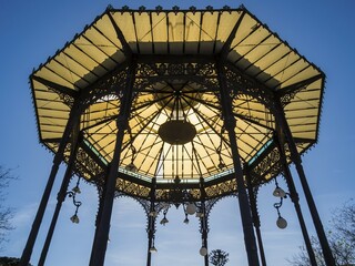 Pavillion in backlight at Giardino Bellini, oldest urban park of Catania, Catania, Sicily, Italy,...