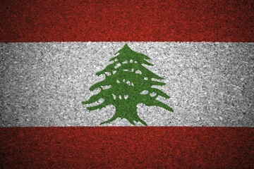 The Lebanese flag painted on a cork board