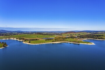 Drone shot, Reservoir Forggensee at low tide, Dietringen, region Füssen, Ostallgäu, Bavaria, Germany, Europe
