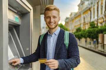 AI generated, A young man with a cheque card withdraws money from an ATM, 25, 30, years