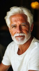 A relaxed senior man sits contentedly in a cozy environment, his thick white beard and warm smile radiating joy as soft sunlight fills the room, creating a peaceful atmosphere