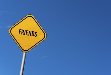 Friends, yellow sign with blue sky