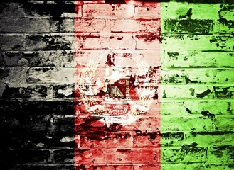 Obraz premium Flag of Afghanistan painted on brick wall
