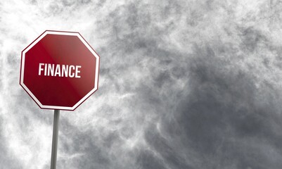 Finance, red sign with clouds in background