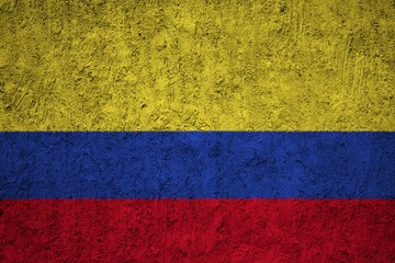 Colombia Flag painted on the cracked grunge concrete wall