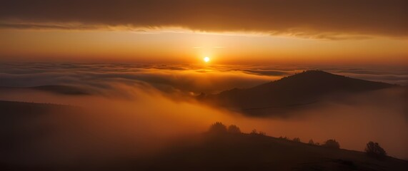 Fototapeta premium A warm inviting sunrise bathing the landscape in hues of gold and orange