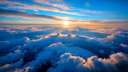 Aerial sunrise over stunning cloudscape and blue sky