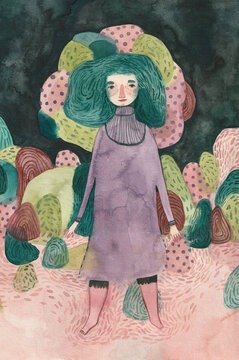 Girl in the middle of colourful mountains