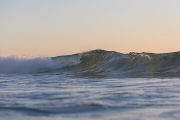 Small wave barrel in the beach.