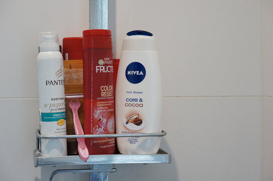 Closeup of shampoos and shower gel bottles in the bathroom
