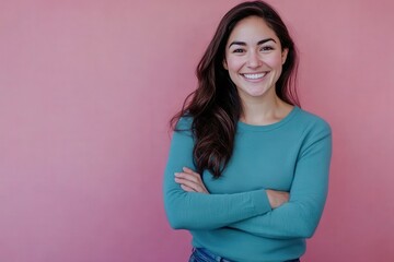 Obraz premium A woman with curly hair smiles in a blue sweater and jeans