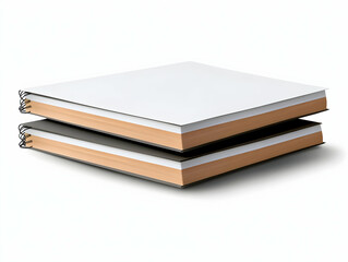 Naklejka premium Two Spiral-Bound Notebooks Stacked Neatly on a White Background