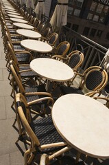 Empty chairs and tables in a downtown pub on the Alster River, Hamburg, Germany, Europe