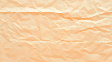 Fototapeta premium Crumpled Peach-Colored Paper Creates a Textured Background, Ideal for Design Projects or as Wallpaper