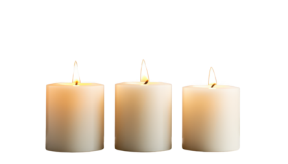 Three pillar candles isolated on transparent background