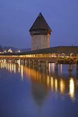 Kapellbruecke mit water tower at dusk, Lucerne, Switzerland, Europe