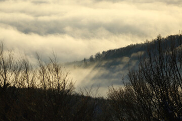 Foggy landscape from above, winter weather inversion