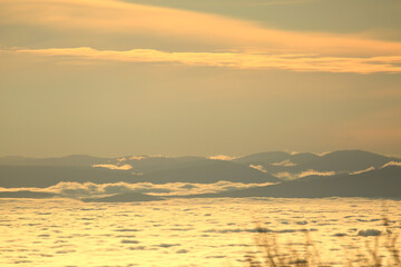 Foggy landscape from above, winter weather inversion