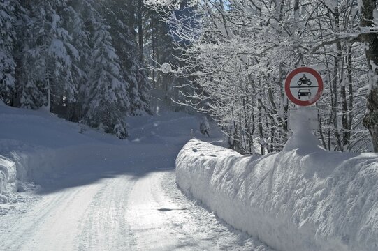 Prohibition sign at snow covered street Valepp near Spitzingsee lake Spitzing Upper Bavaria Germany