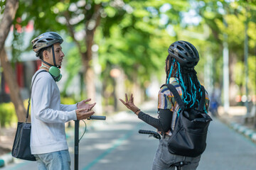 Fototapeta premium Young Commuters with Eco-Friendly Transportation