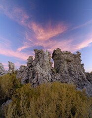 Red clouds forming over interesting tuff rock formations in the evening, Mono Lake, Lee Vining, California, USA, North America