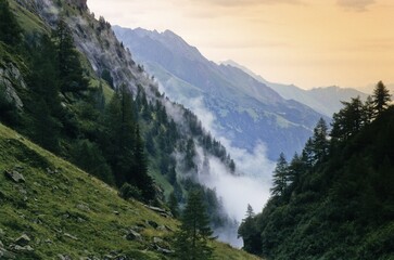 Cloud filled valley in the Stubai Alps, Tyrol, Austria, Europe