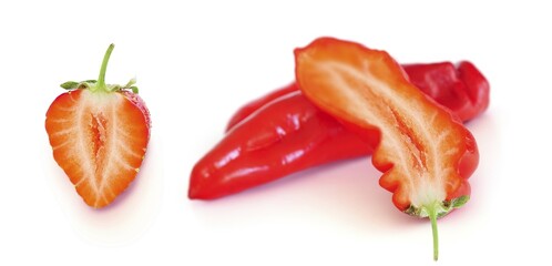 Capsicum filled with Strawberry, symbolic image for genetic engineering