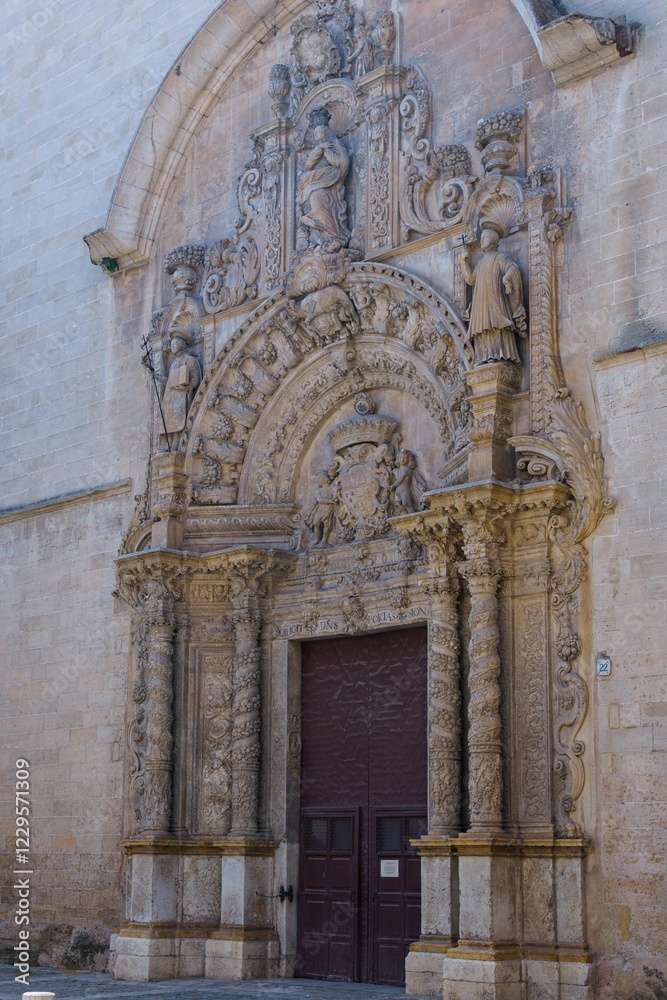 Wall mural Ornate stone facade of a historic cathedral.