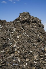 Pile of discarded automotive debris at a waste management site, Quebec, Canada, North America