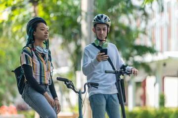 Obraz premium Young Commuters with Eco-Friendly Transportation
