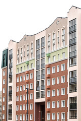 Fototapeta premium Multi-story residential building with colorful architecture, featuring geometric patterns, urban housing concept