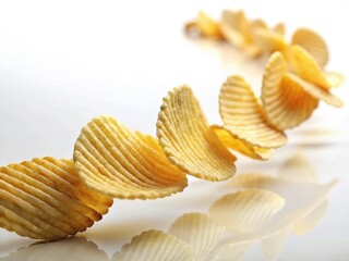 Miniature Cosmic Crisp apples, a tilted-shift wonderland, resembling space-age potato chips.