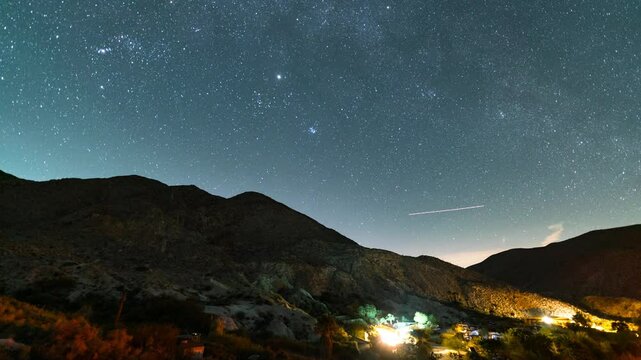 Timelapse of night sky over Agua Caliente Springs in Anza Borrego Desert State Park in California