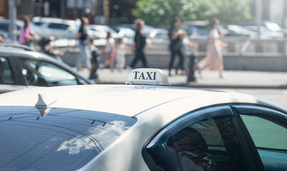 Taxi in the city street at summer.