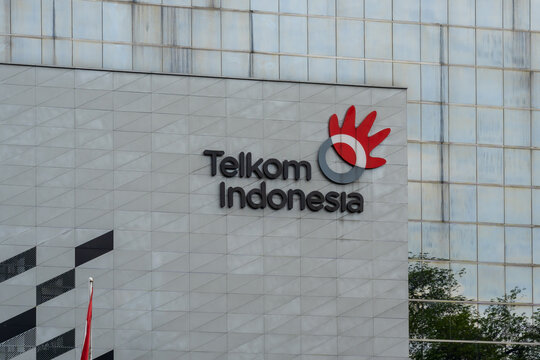Jakarta, Indonesia - January 23, 2025: Telkom Indonesia logo sign on the building in Jakarta, Indonesia. Telkom Indonesia is an Indonesian multinational telecommunications conglomerate. 
