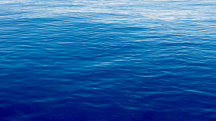 Fototapeta premium Calm sea. Top view of calm water surface. Sea surface background. Ocean texture.