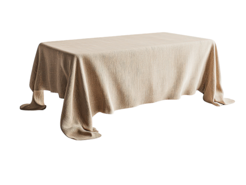 Table set with a beige cloth creating a simple and elegant dining setting for various occasions