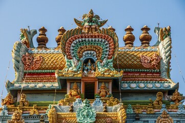 Colorful and decorated Hindu temple with idols of Hindu worship, temple city Srirangam, Iruchirappalli District, Tamil Nadu, India, Asia