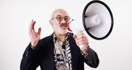 Senior man, speech and megaphone in studio with announcement, broadcast and retirement justice. Speaker, microphone and noise for change of law, society support and call to action on white background