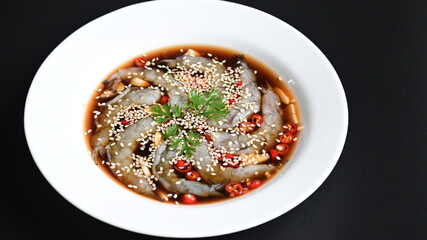 shrimp in soy sauce on white plate, korean style menu