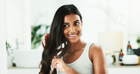 Happy, woman and brush hair for haircare of healthy texture, keratin treatment and growth cosmetics. Smile, female person and tools with grooming routine, scalp maintenance and shine results at house