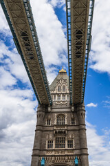Fototapeta premium Upward Perspective of Tower Bridge in London with Steel Suspension Details