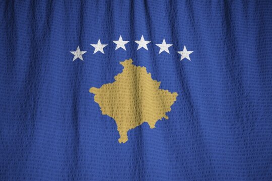 Closeup of Ruffled Kosovo Flag, Kosovo Flag Blowing in Wind