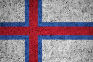 Fototapeta premium Faroe Islands Flag painted on the cracked grunge concrete wall