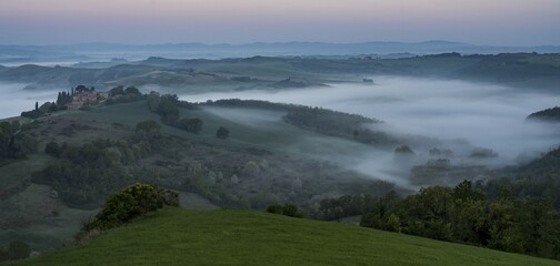 Hilly landscape with foggy atmosphere, sunrise, Crete Senesi, province of Siena, Tuscany, Italy, Europe