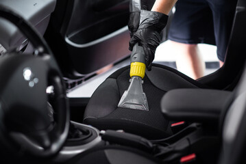  Person dry cleaning a car